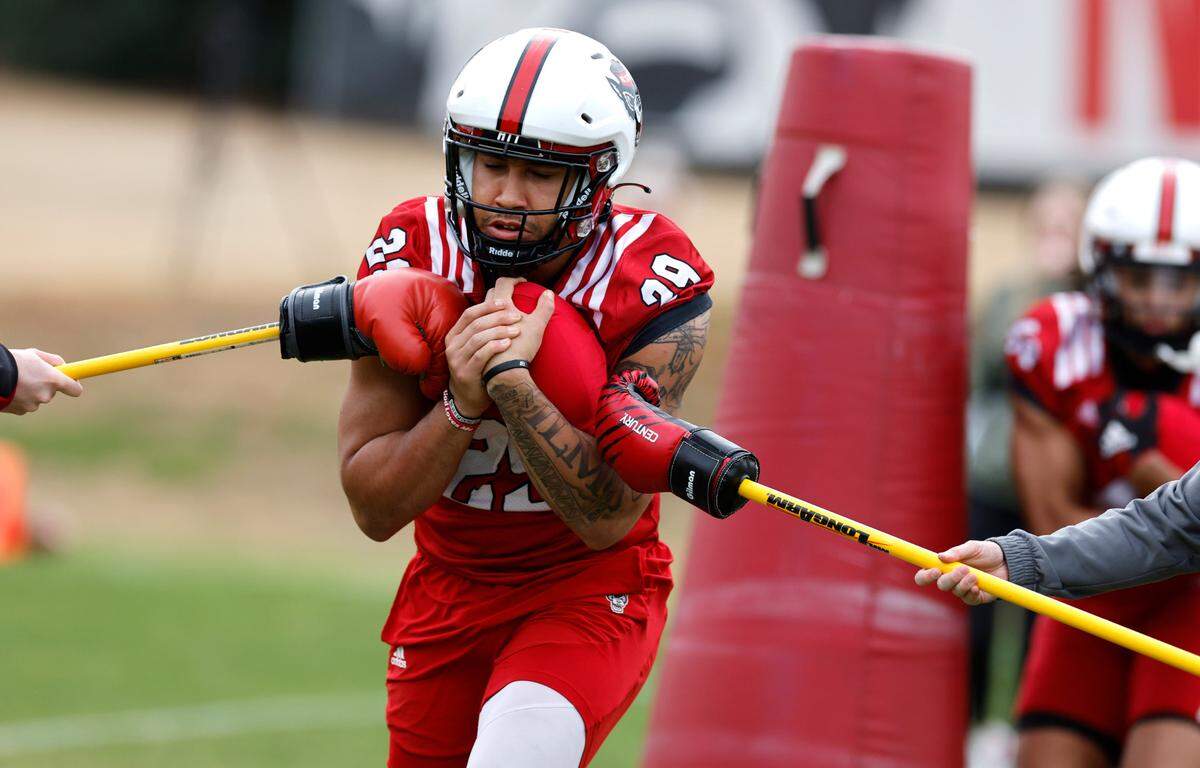 N.C. State’s Christopher Toudle (29) runs drills during the Wolfpack’s first spring practice in Raleigh, N.C., Wednesday, March 1, 2023.