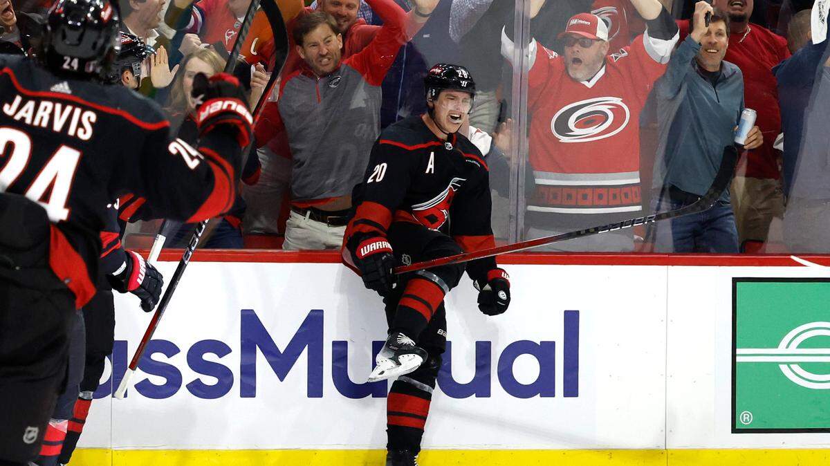 Carolina center Sebastian Aho (20) celebrates after scoring to tie the game 3-3 during the third period of the Hurricanes’ 5-3 victory over the Islanders in the first round of the Stanley Cup playoffs at PNC Arena in Raleigh, N.C., Monday, April 22, 2024.