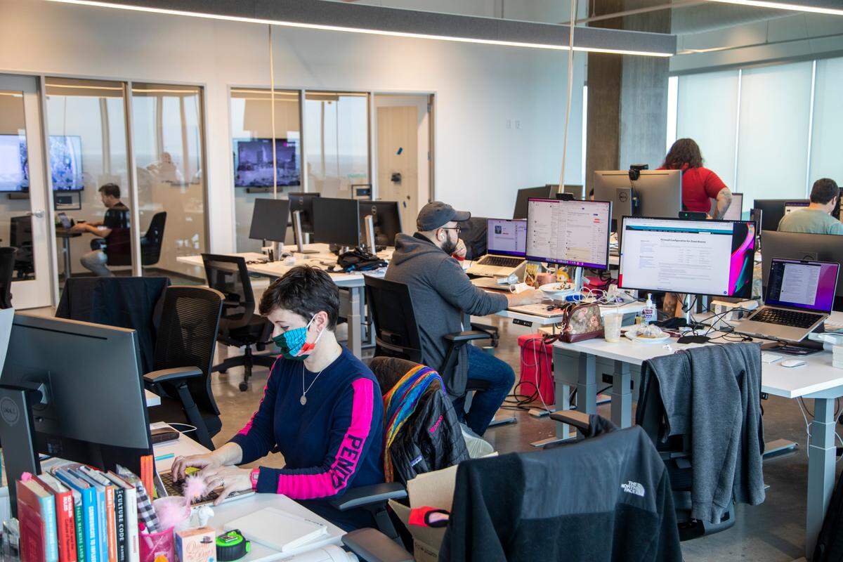Pendo employees work in the software company’s new downtown Raleigh headquarters Wednesday, Feb. 23, 2022.