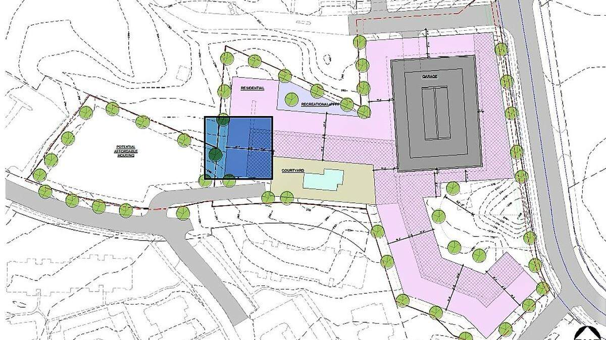 A concept plan shows what could be proposed for 200 S. Elliott Road, currently home to the nonprofit organization Extraordinary Ventures. The initial plan calls for roughly 330 apartments and a 495-space parking deck, with space for a small park.