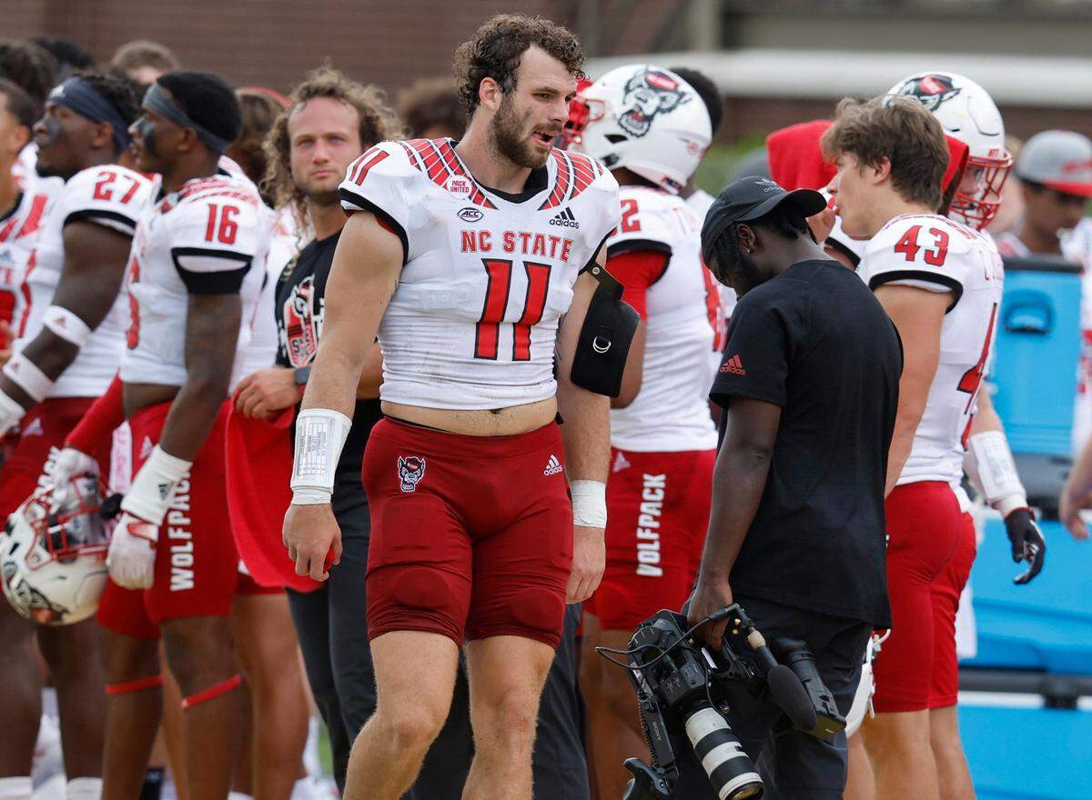 N.C. State linebacker Payton Wilson (11) walks the sideline during the first half of N.C. States game against ECU at Dowdy-Ficklen Stadium in Greenville, N.C., Saturday, Sept. 3, 2022.