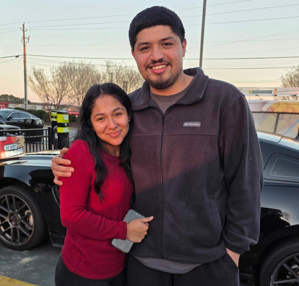 Fatima Issela Velasquez-Antonio with her boyfriend, Bryan Sanchez, after returning home to Wendell on Tuesday, Dec. 23, 2025. She had been held in a federal detention center for more than a month after an immigration sweep.