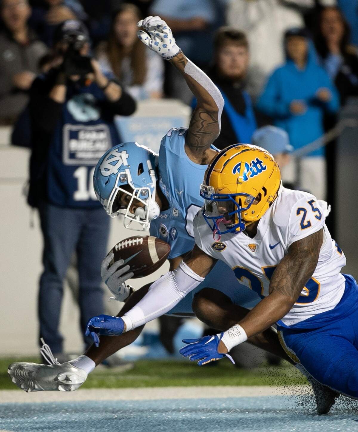 North Carolina’s Antoine Green (3) pulls in a 16-yard pass from quarterback Drake Maye for a touchdown in the first quarter ahead of Pitt’s A.J. Woods (25) on Saturday, October 29, 2022 at Kenan Stadium in Chapel Hill, N.C.