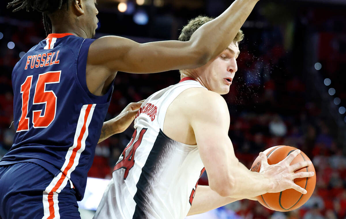 UT Martin’s Christian Fussell (15) guards N.C. State’s Ben Middlebrooks (34) during the second half of N.C. State’s 81-67 victory over UT Martin at PNC Arena in Raleigh, N.C., Tuesday, Dec. 12, 2023.