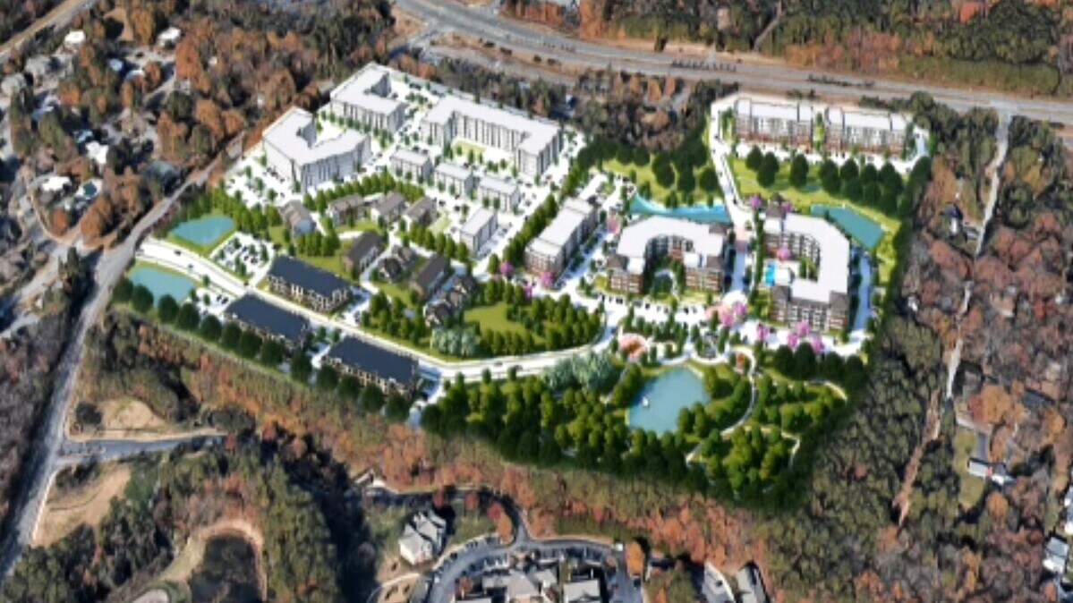 Hillmont is proposed with two apartment buildings fronting N.C. 54 in Chapel Hill, three more apartment buildings at the core, and townhouses and cottages at bottom left. At bottom right is a roughly 6-acre park that the town would like to be publicly accessible.