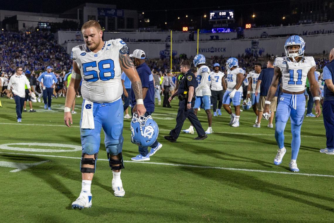 North Carolina center Austin Blake (53) leaves the field following the Tar Heel’ 21-20 loss to Duke on Saturday, September 28, 2024 at Wallace Wade Stadium in Durham, N.C.