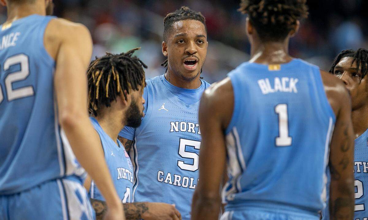 North Carolina’s Armando Bacot (5) talks with his teammates during a time out in the first half during the third round of the ACC Tournament on Thursday, March 9, 2023 at the Greensboro Coliseum in Greensboro, N.C.