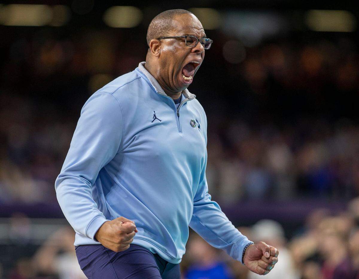 North Carolina head coach Hubert Davis reacts after R.J. Davis drew a foul from Kansas’ Remy Martin with the score tied 57-57 in the second half during the NCAA Championship game on Monday, April 4, 2022 at Caesars Superdome in New Orleans, La.
