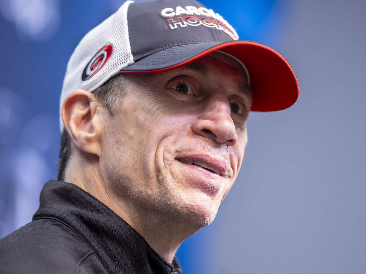 Carolina Hurricanes coach Rod Brind’Amour, flashes a smile when questioned about his starting goalie for Game 4 of the Stanley Cup Final against Vegas, during a press briefing on Monday, June 8, 2026 at T-Mobile Arena in Las Vegas, NV.