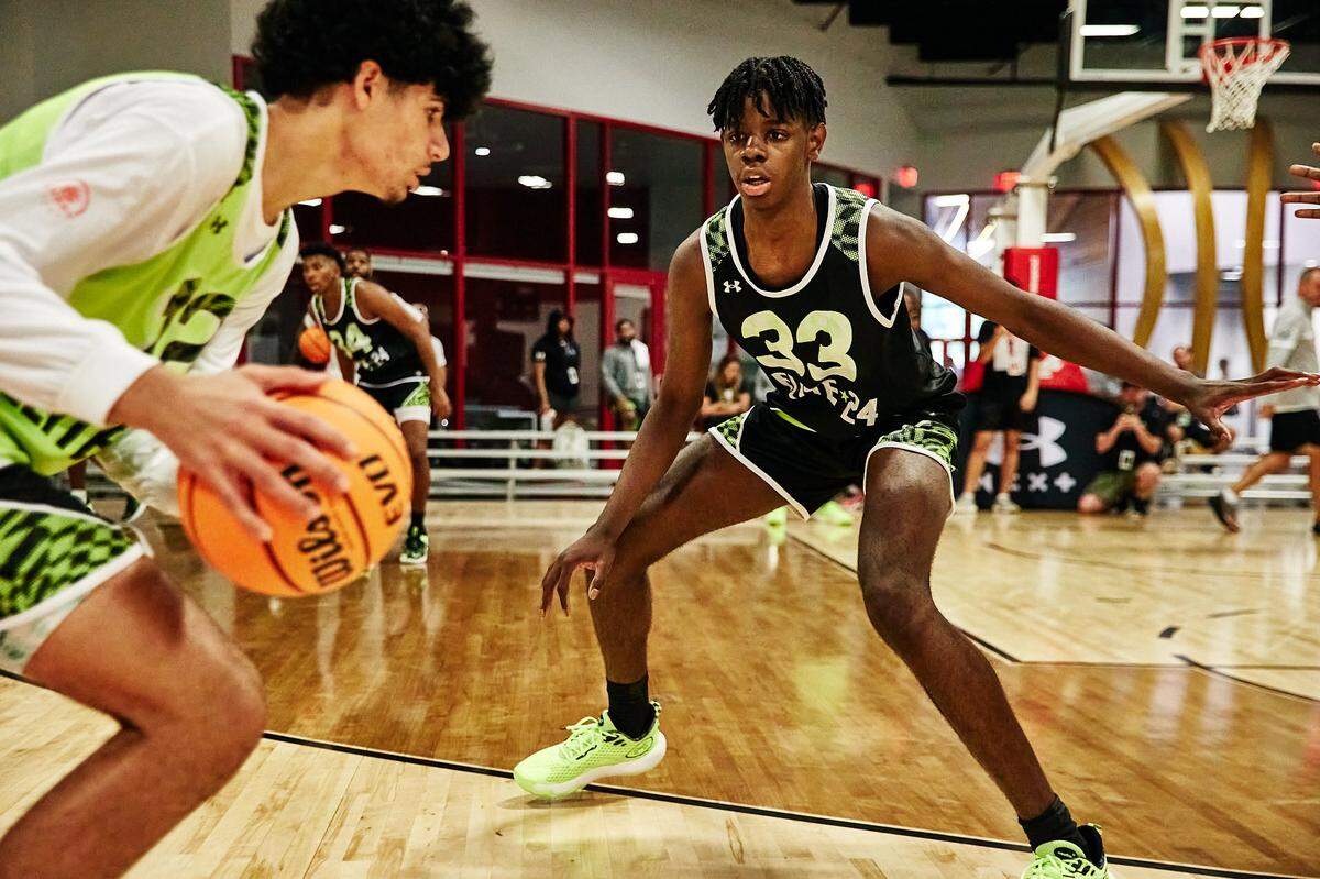 Class of 2025 Kentucky men's basketball recruit Caleb Wilson plays defense during the Under Armour Next Elite 24 event in August 2023 at the CORE4 Atlanta facility in Chamblee, Georgia. 