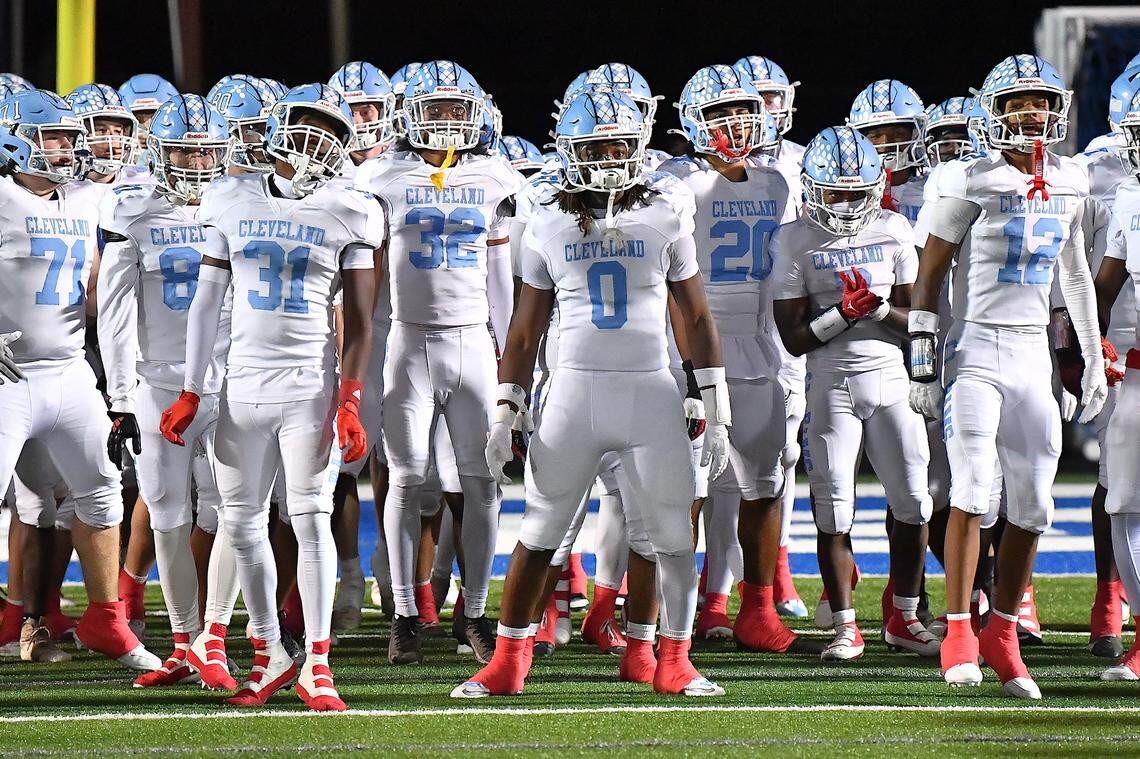 Cleveland running back Kaleb Ferrell (0) and his team are ready to run onto the field for their game against Clayton. The Cleveland Rams took on the Clayton Comets in a conference football game in Clayton, N.C. on October 31st in Clayton, N.C.