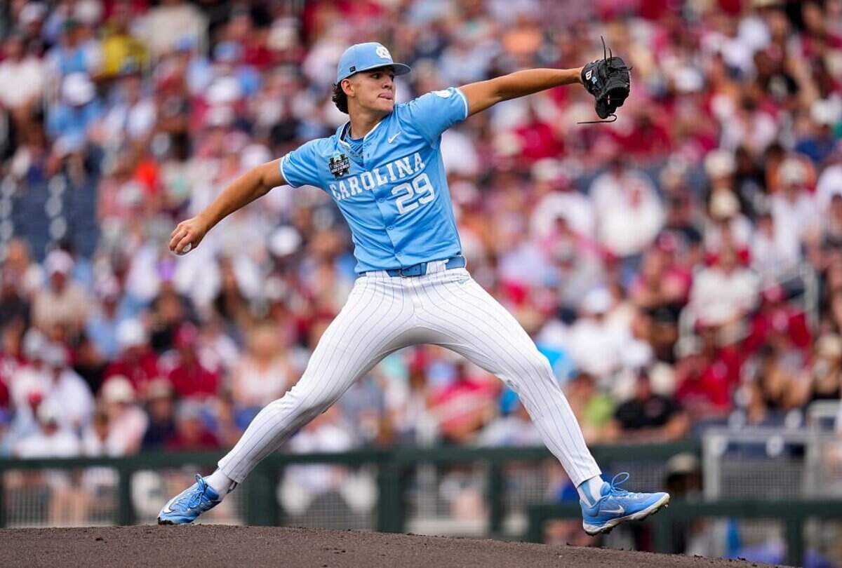 OMAHA, NEBRASKA - JUNE 20: Jason DeCaro #29 of the North Carolina Tar Heels pitches during the first inning against the Oklahoma Sooners in Game 1 of the NCAA College World Series baseball finals at Charles Schwab Field on June 20, 2026 in Omaha, Nebraska. (Photo by Jay Biggerstaff/Getty Images)