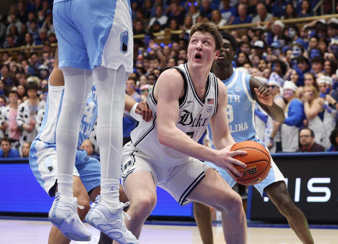Duke’s Kon Knueppel moves inside against UNC defenders in first half action, Saturday, Feb. 1, 2025.