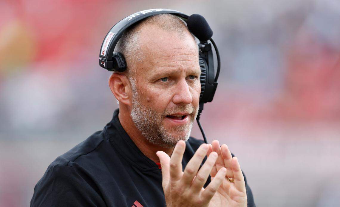 N.C. State head coach Dave Doeren congratulates his team during the second half of N.C. State’s 55-3 victory over Charleston Southern at Carter-Finley Stadium in Raleigh, N.C., Saturday, Sept. 10, 2022.