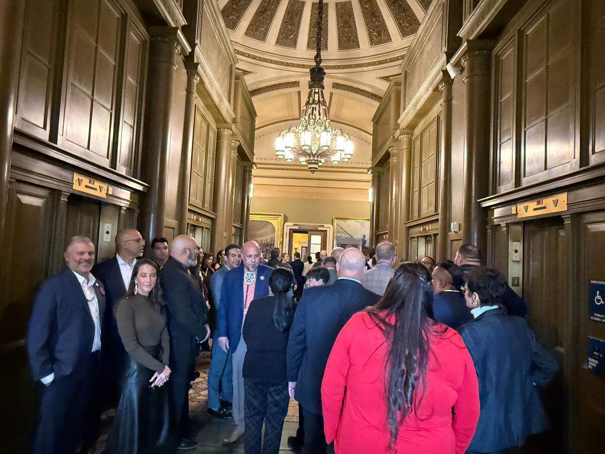 More than 80 members of the Lumbee Tribe of North Carolina gather outside the Senate chamber to watch passage of the Lumbee Recognition Act on Wednesday, Dec. 17, in Washington.