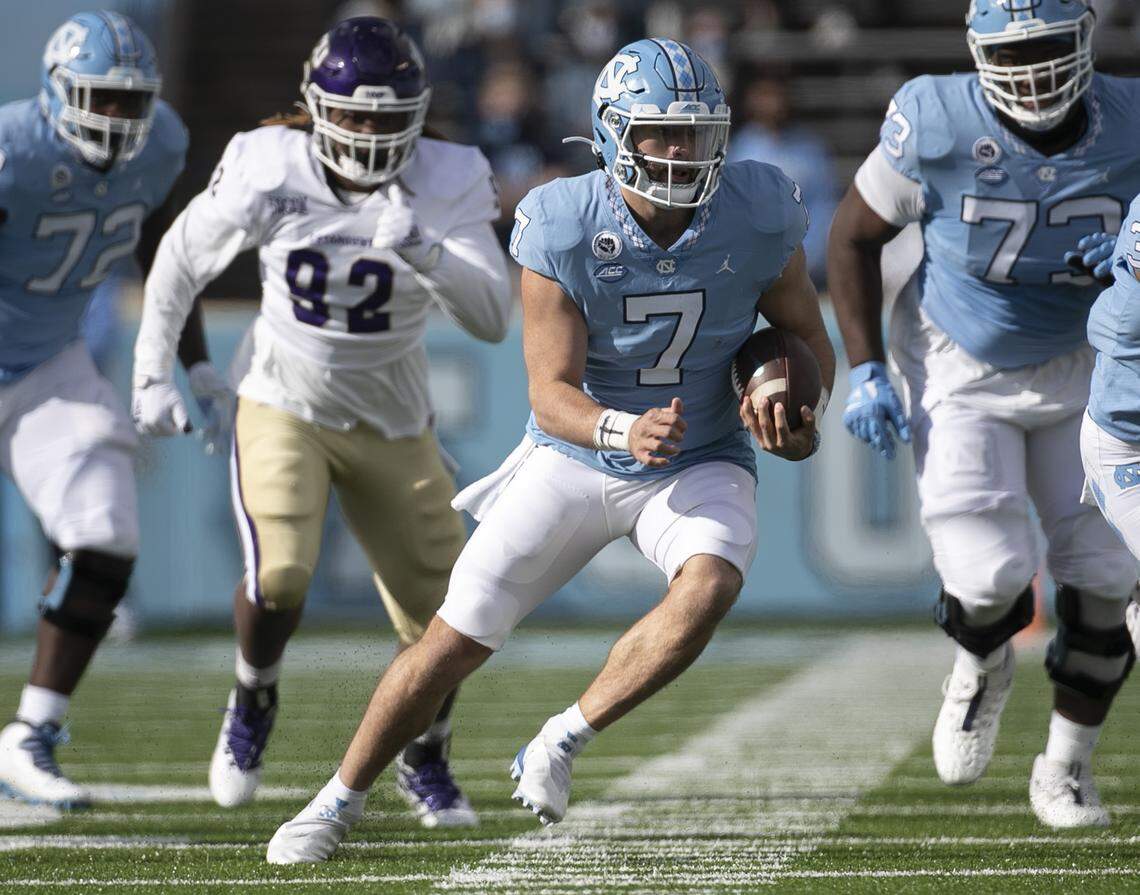 North Carolina quarterback Sam Howell (7) breaks open for a 30-yard gain in the first quarter against Western Carolina on Saturday, December 5, 2020 at Kenan Stadium in Chapel Hill, N.C.