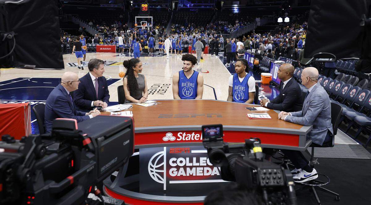 Duke’s Cameron Boozer (12) and Isaiah Evans (3) are interviewed during Duke basketball’s open practice during ESPN’s College GameDay at Capital One Arena in Washington, D.C., Saturday, Feb. 21, 2026.