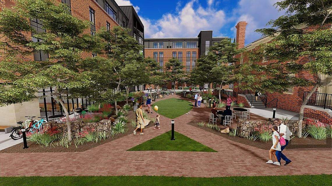 The developer offered revised plans for a West Rosemary Street hotel in downtown Chapel Hill in November 2021. The new plan would move the hotel’s driveway west and create a larger public park between the building and the adjacent Old Town Hall.