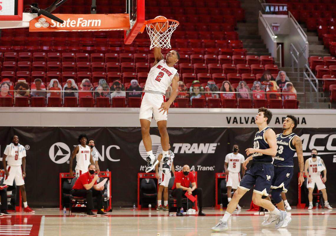 N.C. State’s Shakeel Moore (2) slams in two during the second half of N.C. State’s 95-61 victory over Charleston Southern in the Wolfpack Invitational at Reynolds Coliseum in Raleigh, N.C., Wednesday, Nov. 25, 2020.