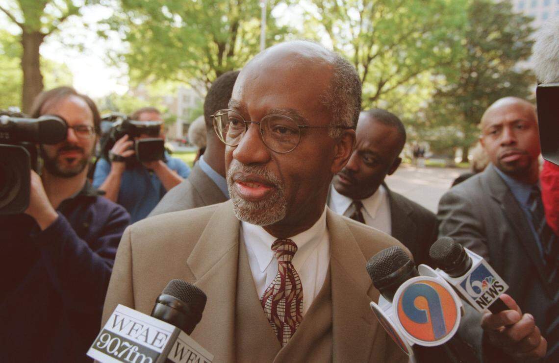 In this April 1999 file photo, attorney James Ferguson talked to the media while walking into the U.S. courthouse in Charlotte prior to the start of the CMS desegregation trial. Ferguson worked on the original Swann case decades earlier.