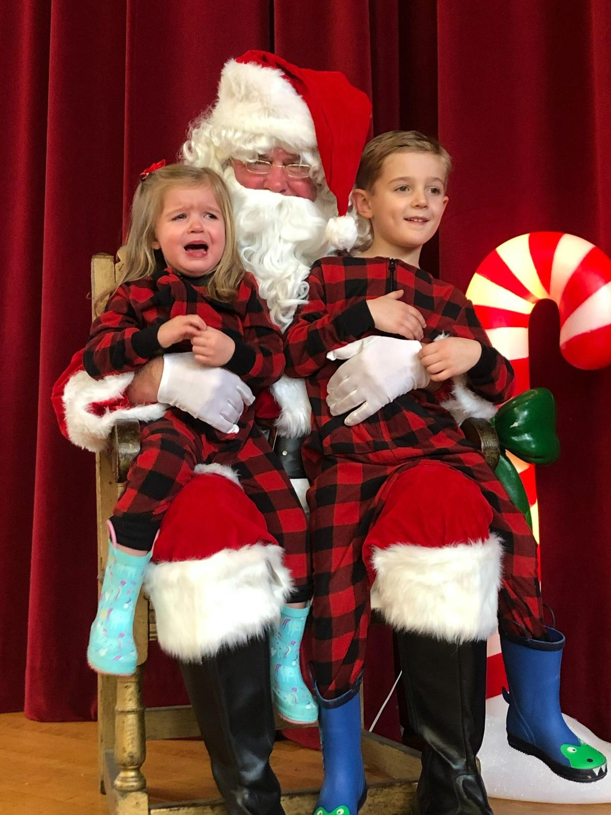 Debra Volkmar’s grandchildren with Santa.