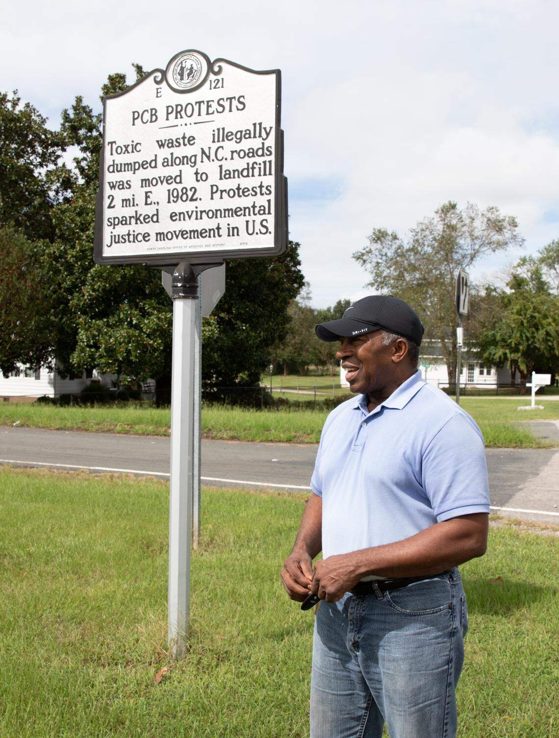 Reverend Bill Kearney stands in front of one of many historical signs in Warrenton. This one has some brief information relating to the birth of the environmental justice movement which has many ties to Warrenton and Warren County.