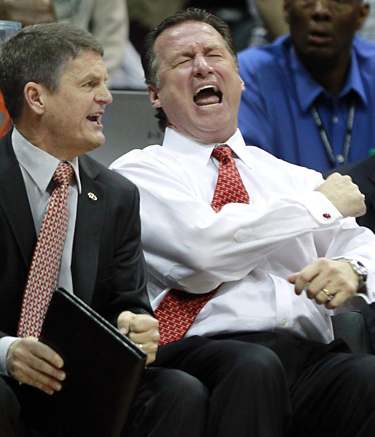N.C. State's Mark Gottfried can't believe the official's call during the second half of North Carolina 69-67 victory over N.C. State in the semifinals of the ACC Tournament Saturday, March 10, 2012, at Philips Arena in Atlanta, GA. Assistant coach Bobby Lutz is to the left.