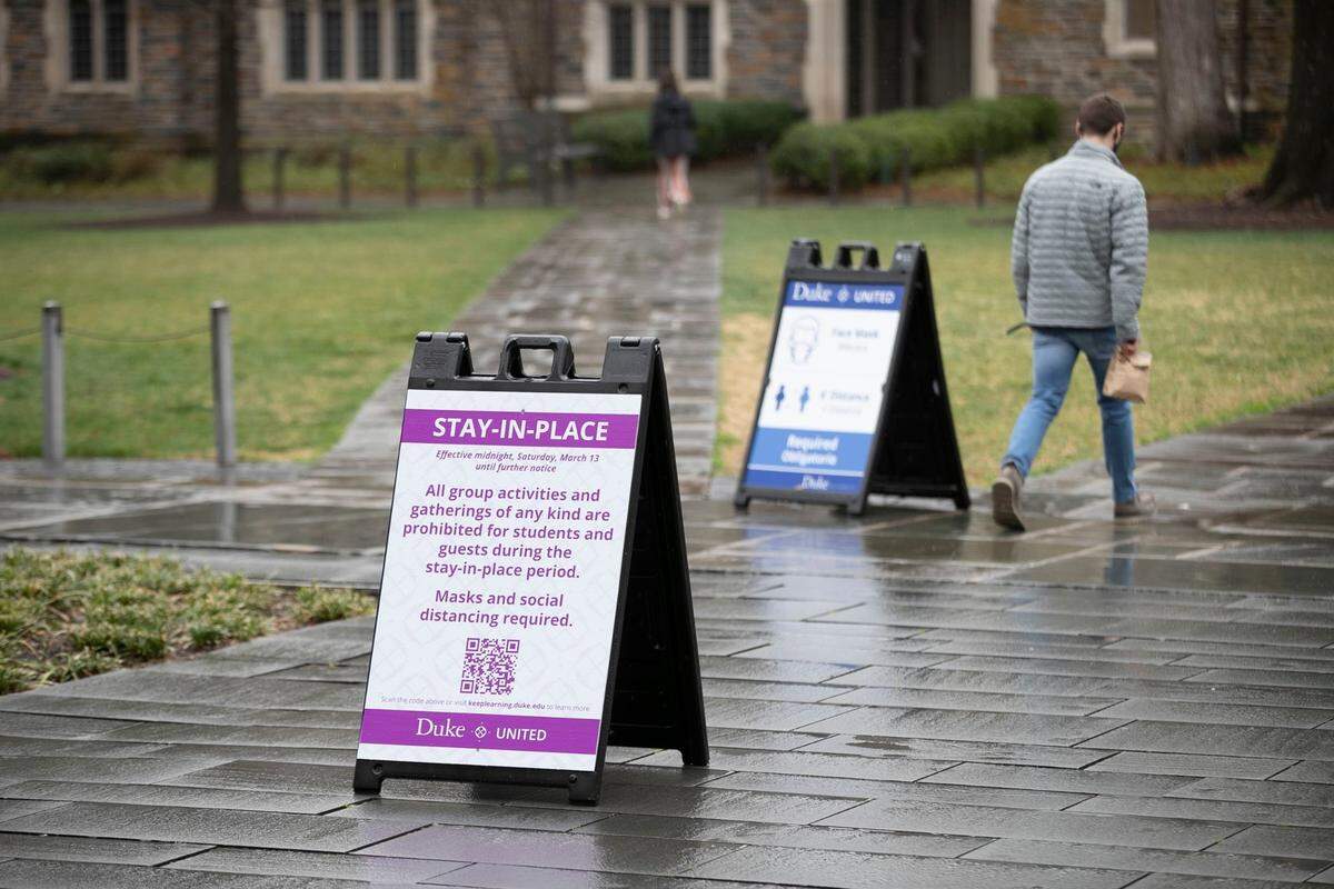 Light foot traffic on Dukes west campus during the lunch hour on Tuesday, March 16, 2021 in Durham, N.C. Duke University instituted a Stay in place order on March 13, following a reported cluster of COVID-19 cases among the student body.