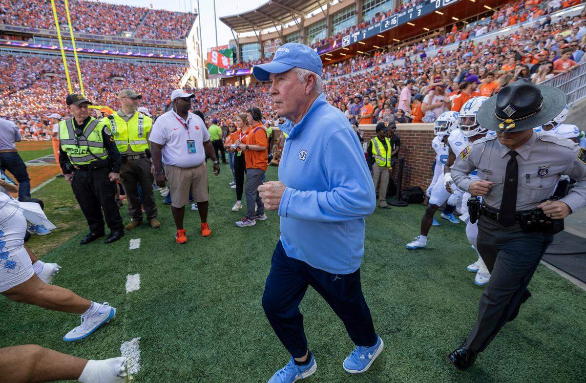North Carolina coach Mack Brown enter Memorial Stadium for the Tar Heels’ game against Clemson on Saturday, November 18, 2023 in Clemson, S.C.