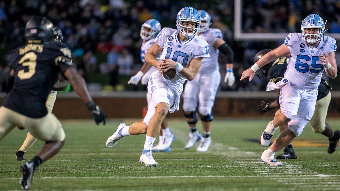 North Carolina quarterback Drake Maye (10) rushes for ten yards in the third quarter against Wake Forest on Saturday, November 12, 2022 at Truist Field in Winston-Salem, N.C.