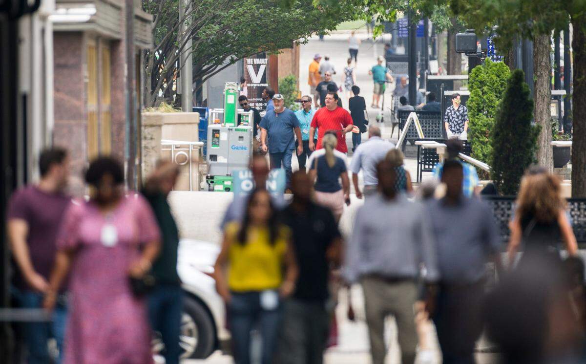 Crowds of people looking for lunch have returned to the streets of downtown Raleigh, N.C., pictured here on July 22, 2021, as vaccinations for COVID-19 have increased and offices are re-opening.