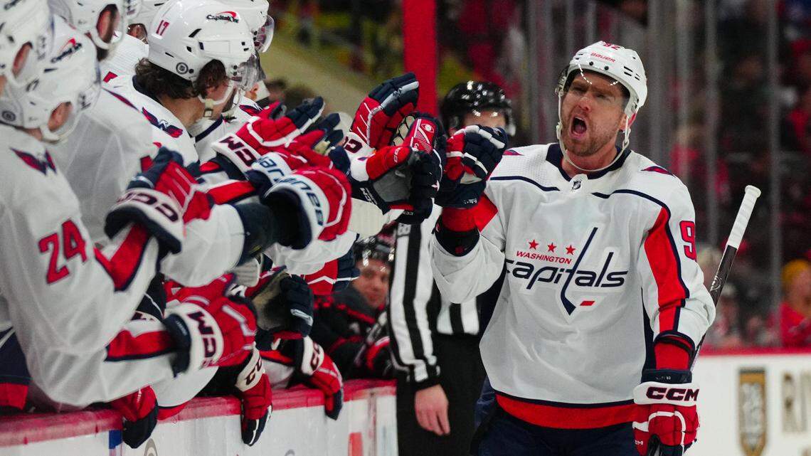 Washington Capitals center Evgeny Kuznetsov (92) celebrates his shoot out goal against the Carolina Hurricanes at PNC Arena.