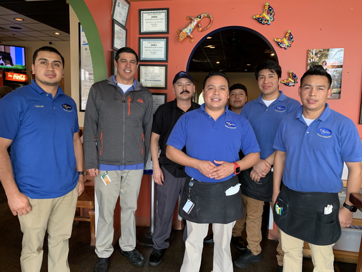 José Luis Sotelo, owner of El Señor restaurant in Knightdale, and with some of his workers.