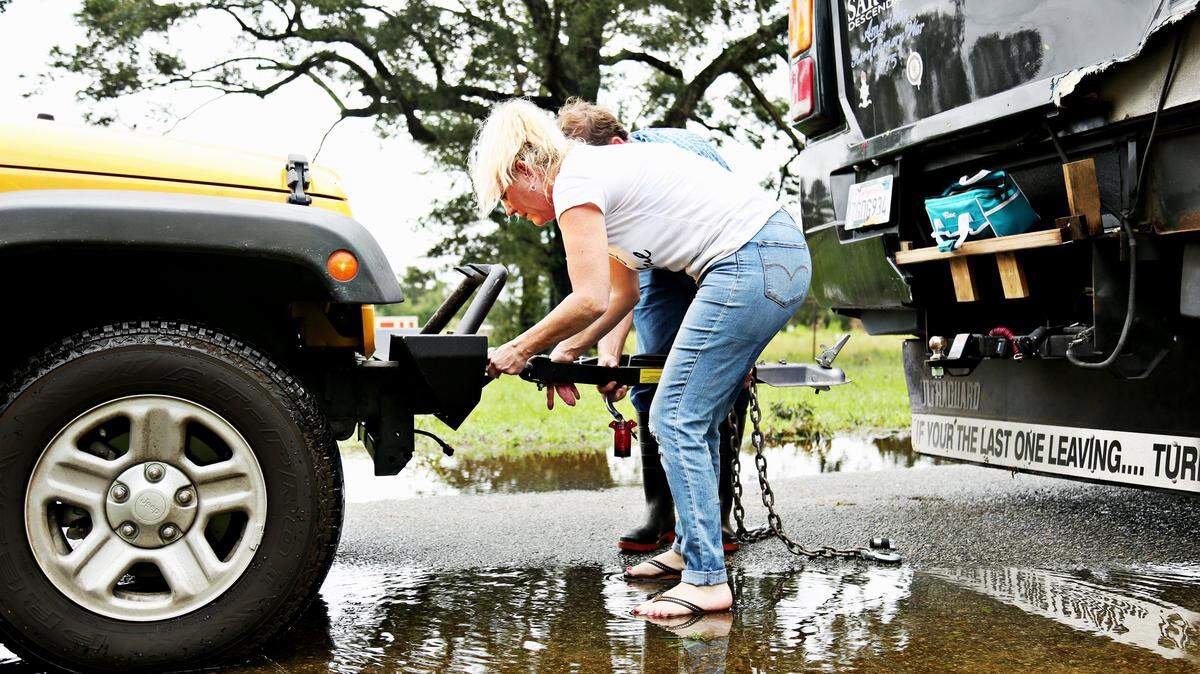 Diane Scott, 51, works on moving her RV parked at Goldsboro’s Edwards Mobile Park that flooded during Hurricane Matthew on Sunday, Sept. 16, 2018. Scott, a traveling nurse from California, is in the area to work temporarily as a surgical nurse at Wayne Memorial Hospital and received a call from the mobile park landlord about removing her RV before the Neuse River possibly floods into the area.