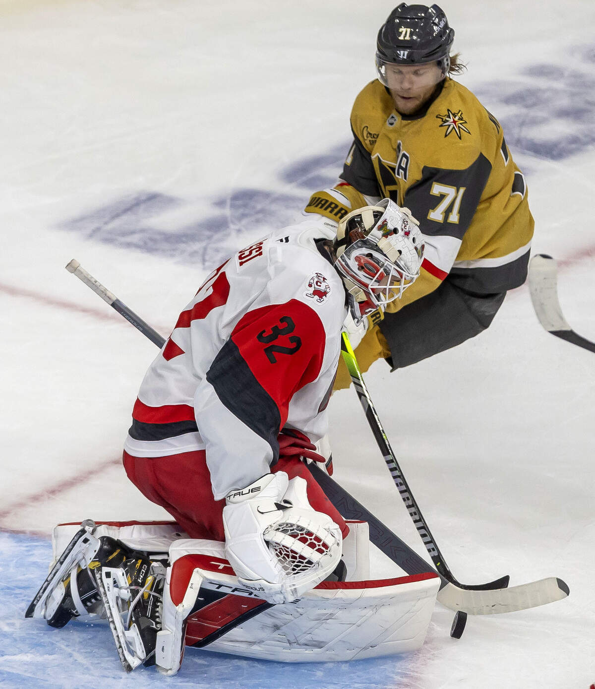 Carolina Hurricanes goalie Brandon Bussi (32) stops a scoring attempt by Vegas center William Karlsson (71) in the first overtime period in Game 3 of the Stanley Cup Final, on Saturday, June 6, 2026 at T-Mobile Arena in Las Vegas, NV.
