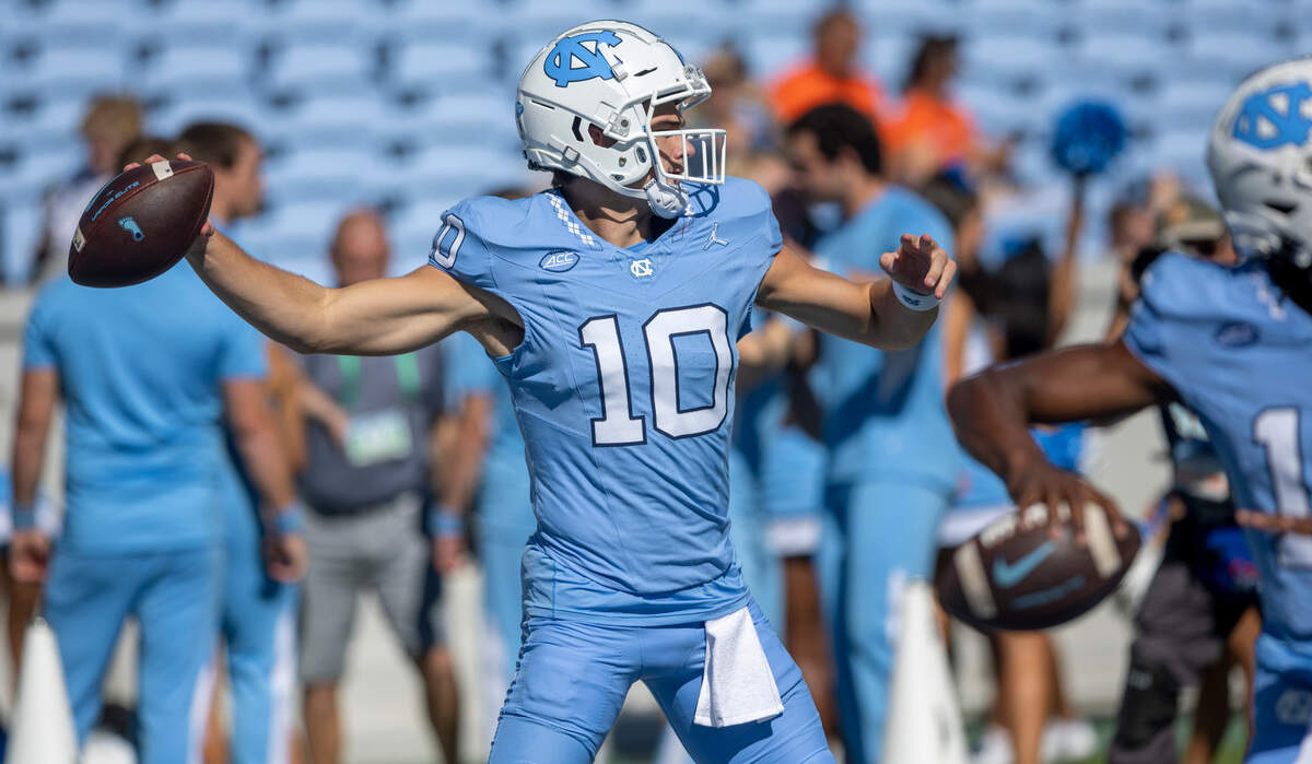 North Carolina quarterback Drake Maye (10) warms up for the Tar Heels’ game against Syracuse on Saturday, October 7, 2023 at Kenan Stadium in Chapel Hill, N.C.