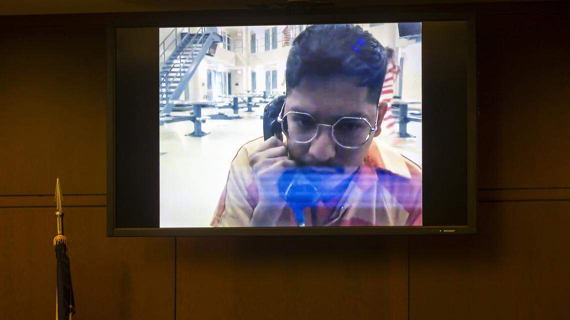 Brayan Alvarez Ortiz, 28,makes his first appearance in Wake County District Court via a video feed from jail on Thursday, Dec. 11, 2025, where he is being held without bond. Ortiz, a UNC Rex Hospital nurse, is accused of sexually assaulting patients who were recovering from surgery.