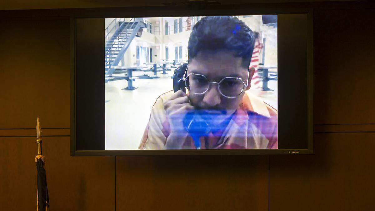 Brayan Alvarez Ortiz, 28,makes his first appearance in Wake County District Court via a video feed from jail on Thursday, Dec. 11, 2025, where he is being held without bond. Ortiz, a UNC Rex Hospital nurse, is accused of sexually assaulting patients who were recovering from surgery.