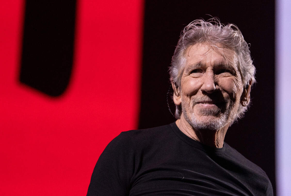 Roger Waters smiles at the crowd at the beginning of his concert at Raleigh, N.C.’s PNC Arena, Thursday night, Aug. 18, 2022.