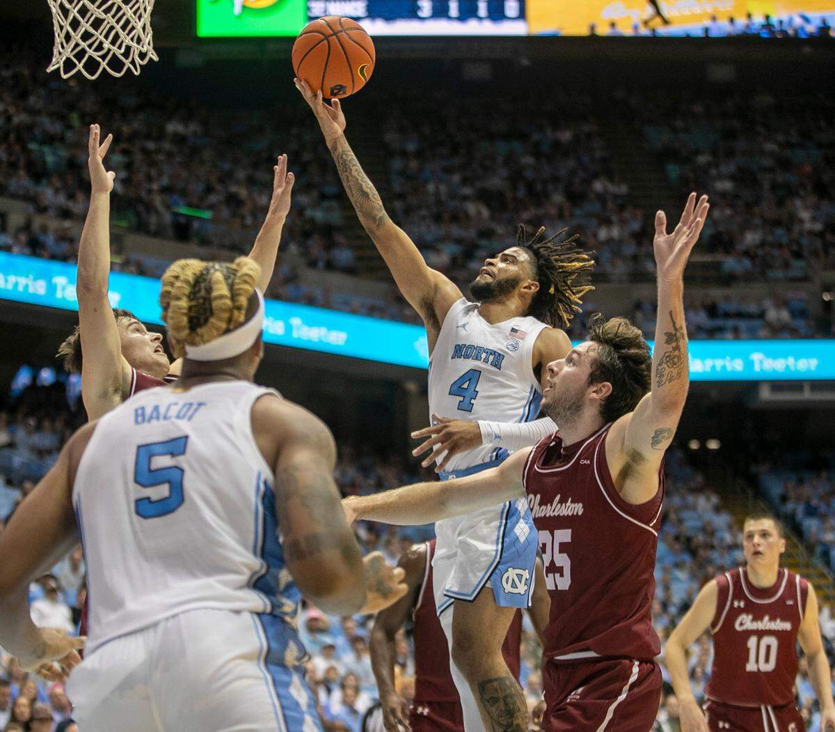North Carolina’s R.J. Davis (4) drives to the basket against College of Charleston during the first half on Friday, November 11, 2022 at the Smith Center in Chapel Hill, N.C.