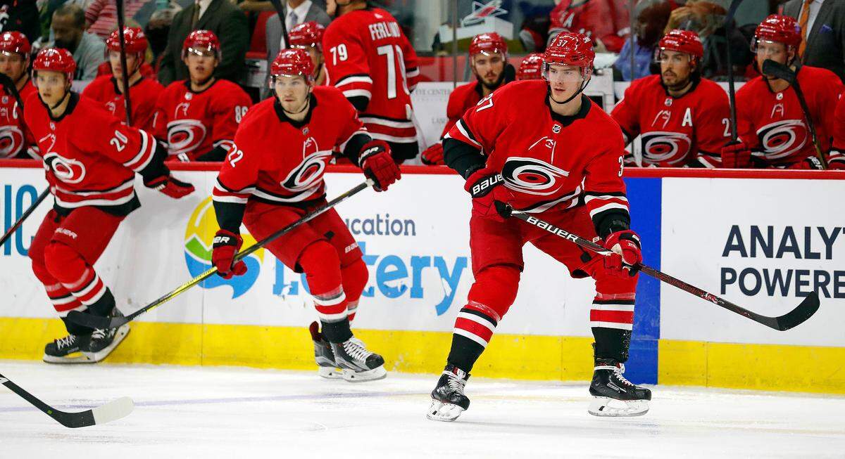 Carolina Hurricanes’ Andrei Svechnikov (37), Brett Pesce (22) and Sebastian Aho (20) take to the ice during the first period against the Vancouver Canucks, Tuesday, Oct. 9, 2018.