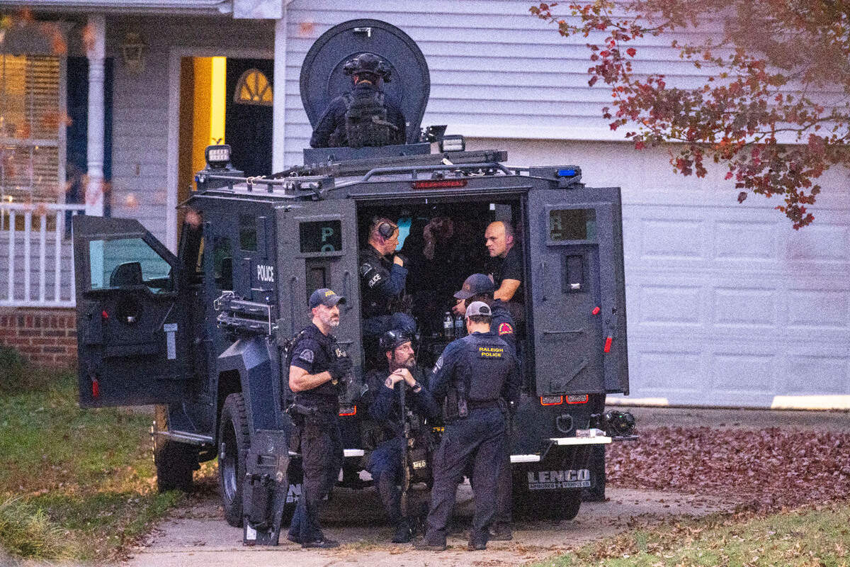 Raleigh Police work the scene where two “persons of interest” were detained on Kentford Court in Raleigh on Thursday, Nov. 7, 2024, after a series of shootings on I-40. Andrew Graney, 25, was charged in the incidents but required mental health treatment to proceed with his case.