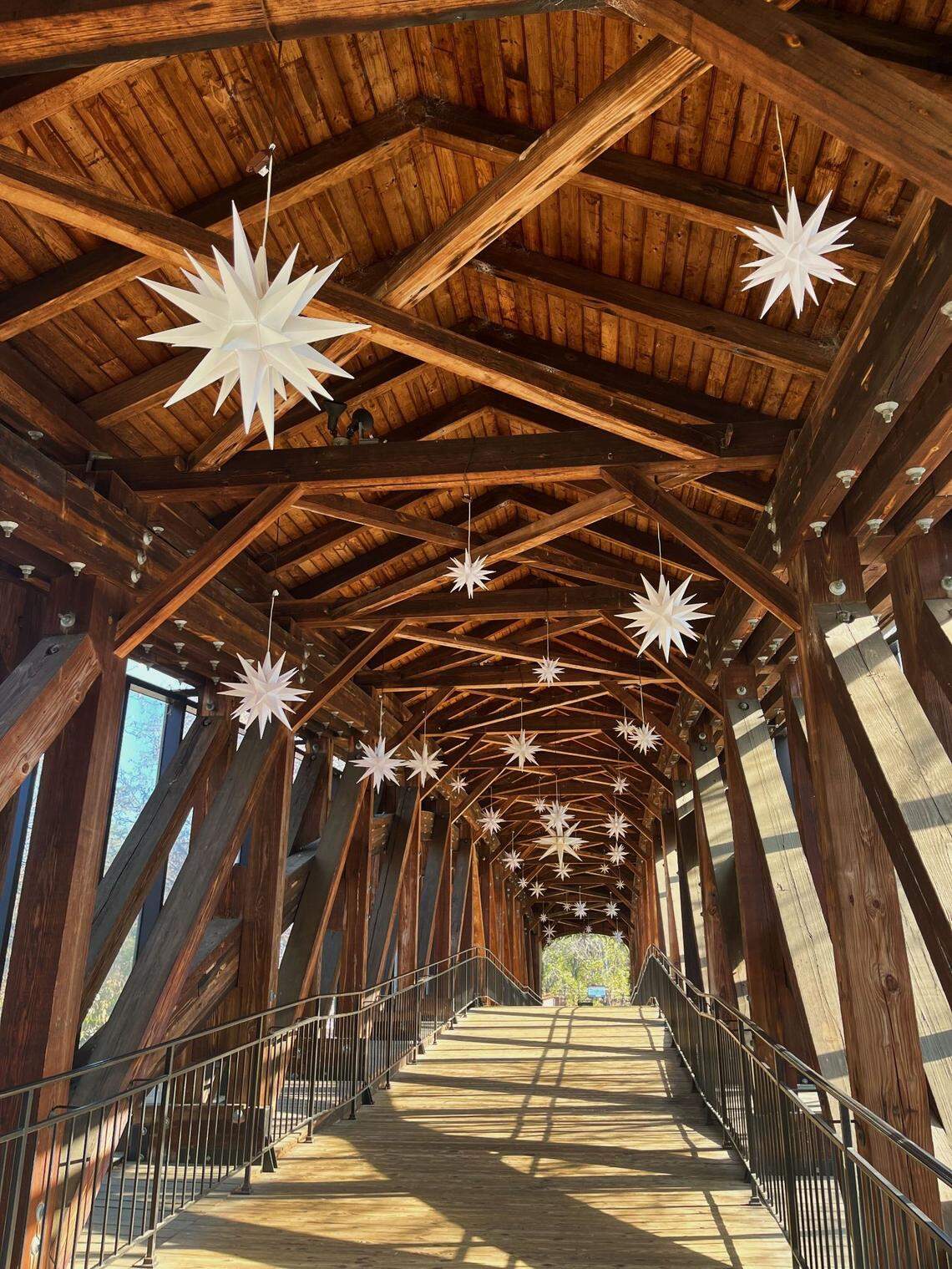 Moravian stars hang in the Heritage Bridge at Old Salem Museums and Gardens on Nov. 19, 2022.