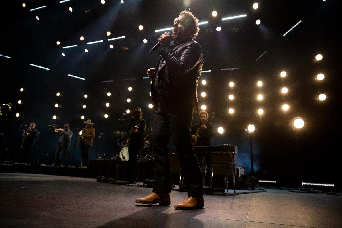 Nathaniel Rateliff belts out a song in concert at Raleigh, N.C.’s Red Hat Amphitheater, Wednesday night, Sept. 27, 2023.