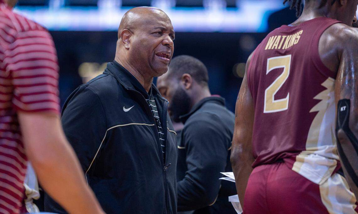 Florida State coach Leonard Hamilton talks with his players during a time out in the first half against North Carolina in the first half on Saturday, December 2, 2023 at the Smith Center in Chapel Hill, N.C.
