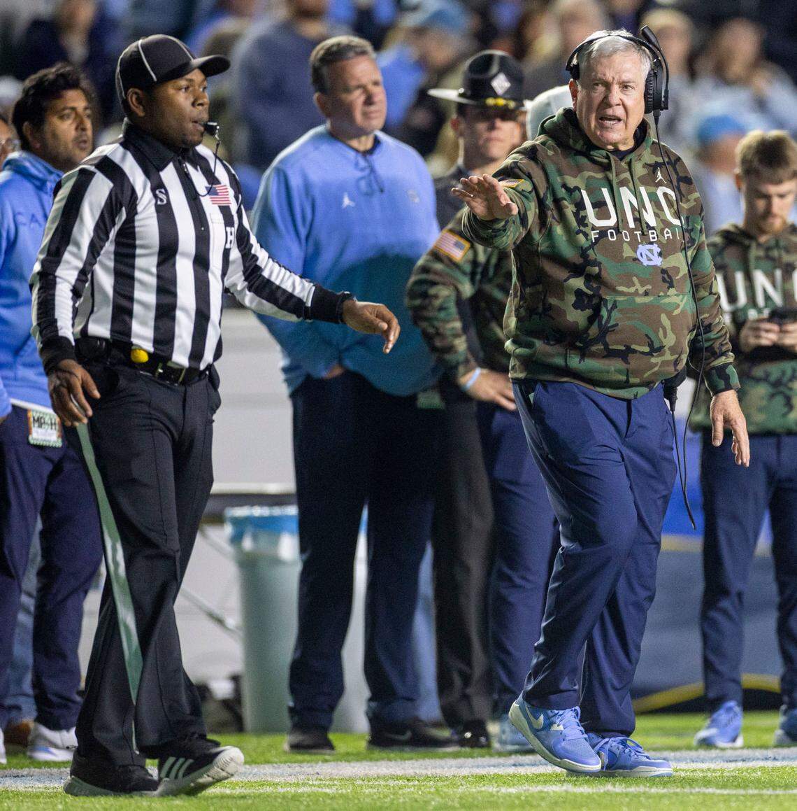 North Carolina coach Mack Brown has a word with Head Linesman Josiah Ford in the second quarter against Wake Forest on Saturday, November 16, 2024 at Kenan Stadium in Chapel Hill, N.C.