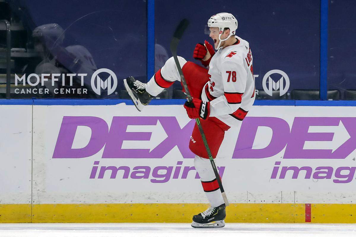 Carolina Hurricanes’ Steven Lorentz celebrates his goal against the Tampa Bay Lightning during the second period of an NHL hockey game Tuesday, April 20, 2021, in Tampa, Fla. (AP Photo/Mike Carlson)