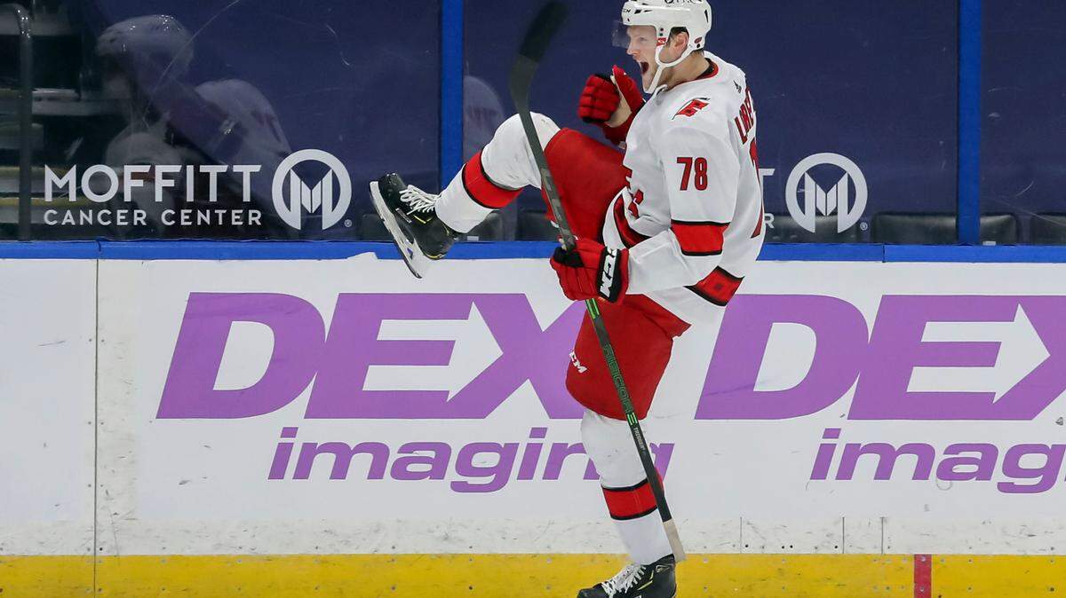 Carolina Hurricanes’ Steven Lorentz celebrates his goal against the Tampa Bay Lightning during the second period of an NHL hockey game Tuesday, April 20, 2021, in Tampa, Fla. (AP Photo/Mike Carlson)