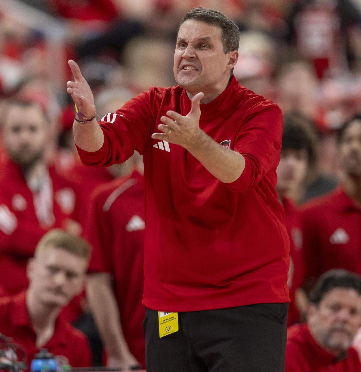 N.C. State coach Will Wade questions a call by an official in the first half against North Carolina on Tuesday, February 17, 2026 at Lenovo Center in Raleigh, N.C.