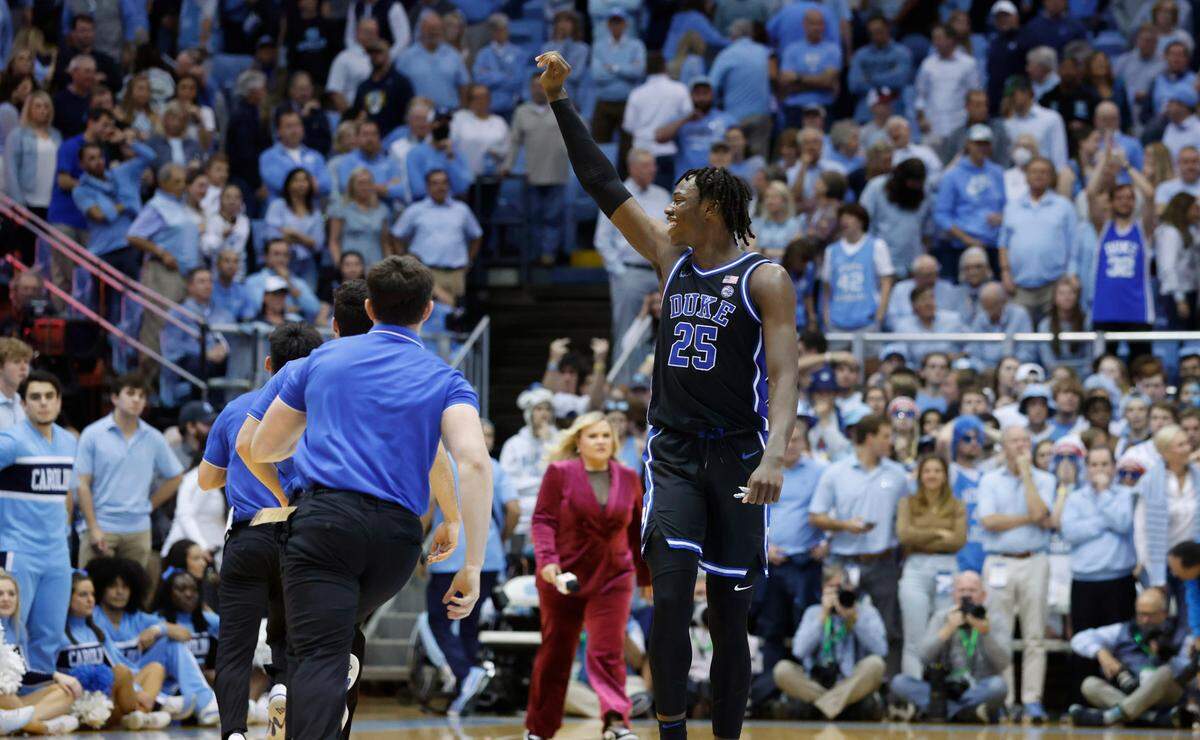 Duke’s Mark Mitchell (25) motions to the crowd after Duke’s 62-57 victory over UNC at the Smith Center in Chapel Hill, N.C., Saturday, March 4, 2023.